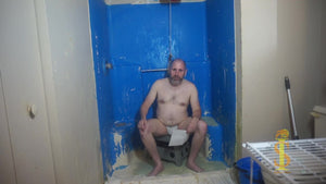 Man sitting looking annoyed